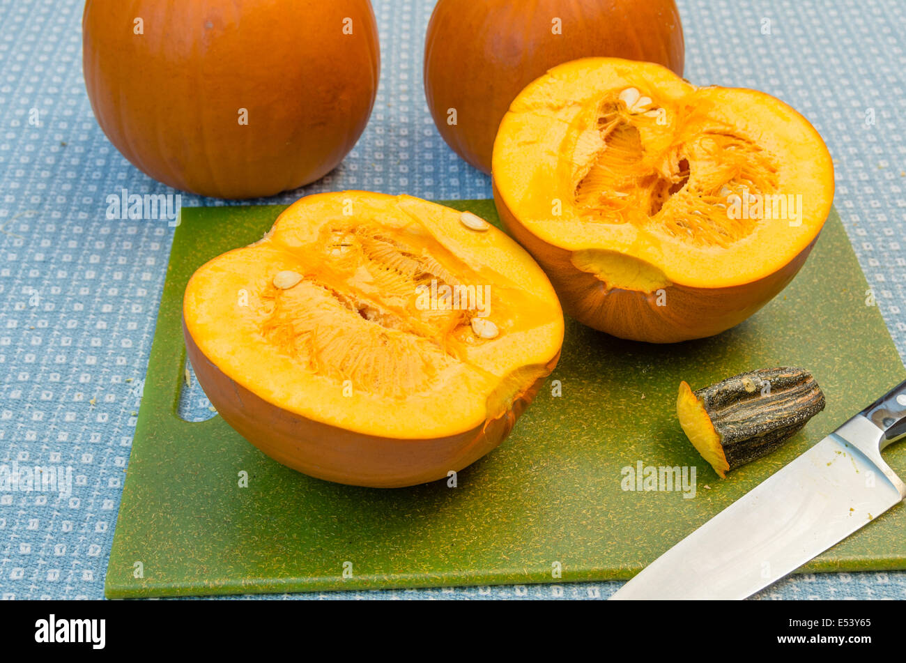 Pumpkins cut open to extract the seeds Stock Photo Alamy