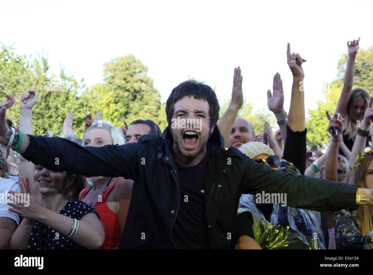 Nottingham, East Midlands, UK. 19th July 2014. A music fan reacts to a performance by Sheffield's Reverend and the Makers at Splendour Festival 2014 in the grounds of Nottingham's Wollaton Hall. Stock Photo
