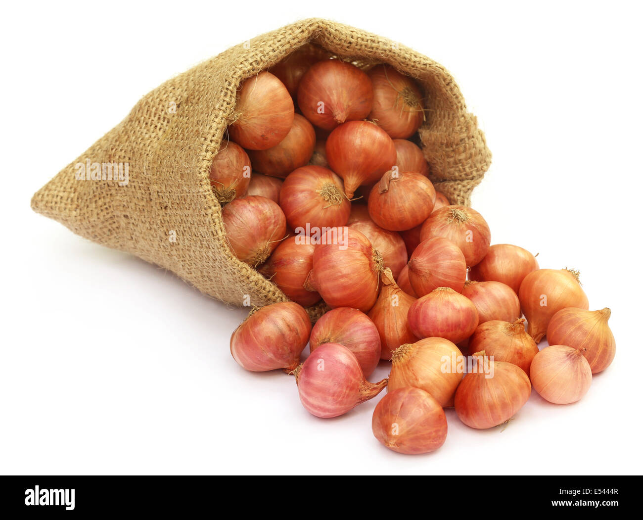Sack with onion over white background Stock Photo