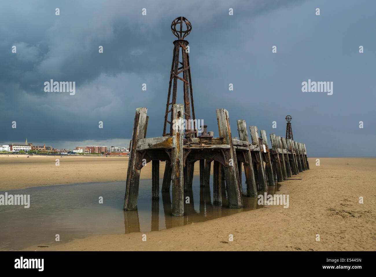Remains of wooden pier at Lytham St Annes in Lancashire Stock Photo