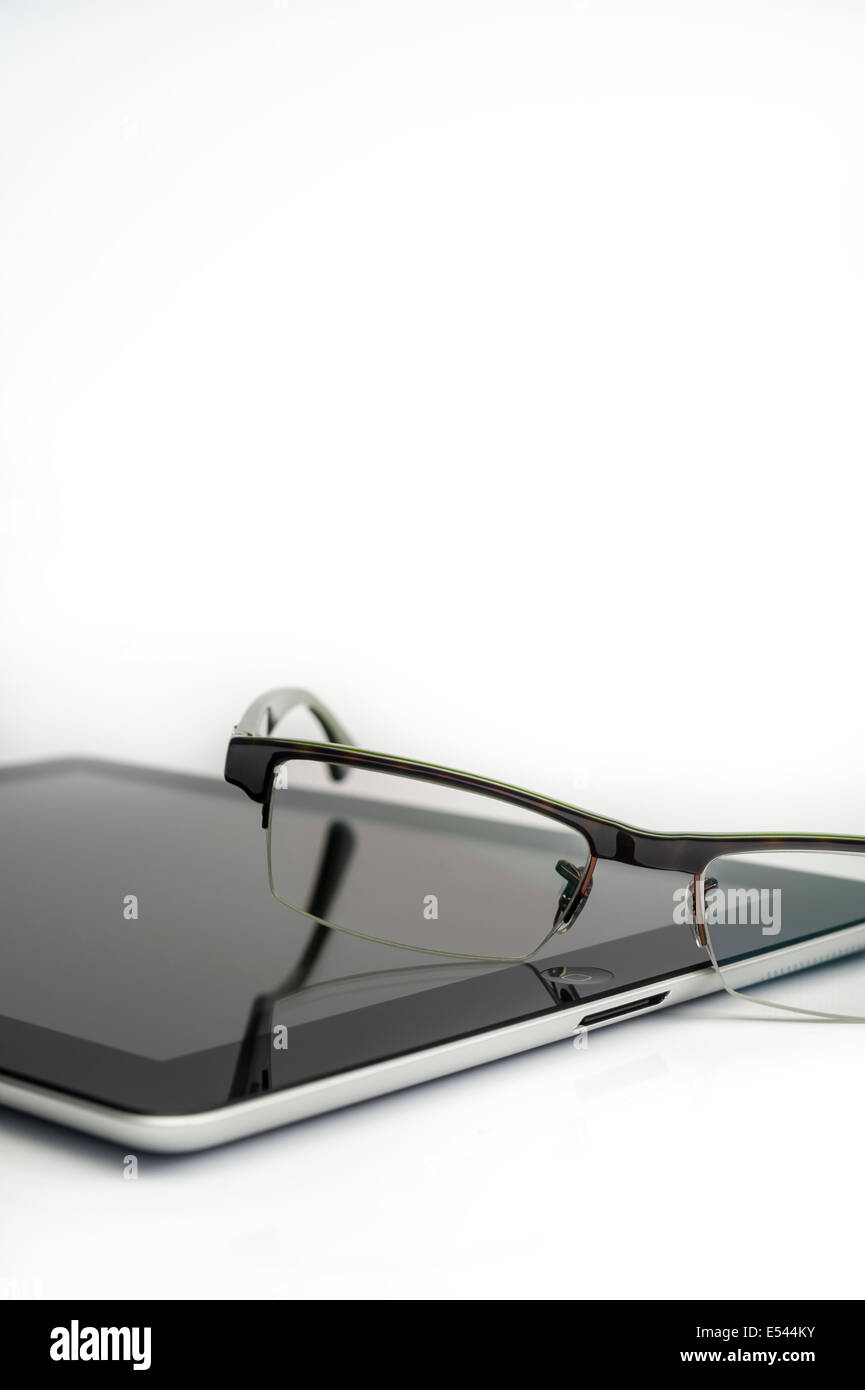 iPad and reading glasses Stock Photo Alamy