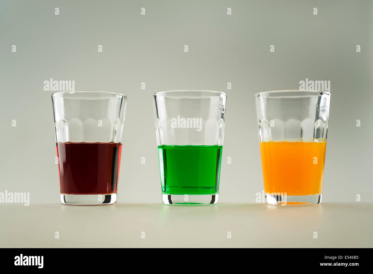 three snifters with liquor Stock Photo Alamy