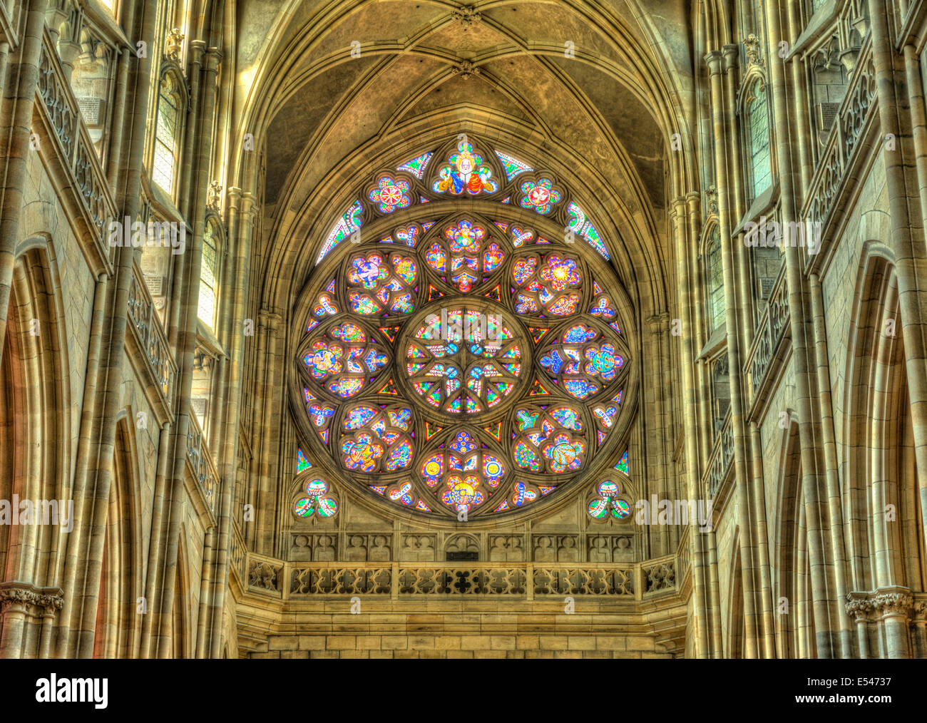 Stained windows in St. Vitus Cathedral located within Prague Castle Stock Photo