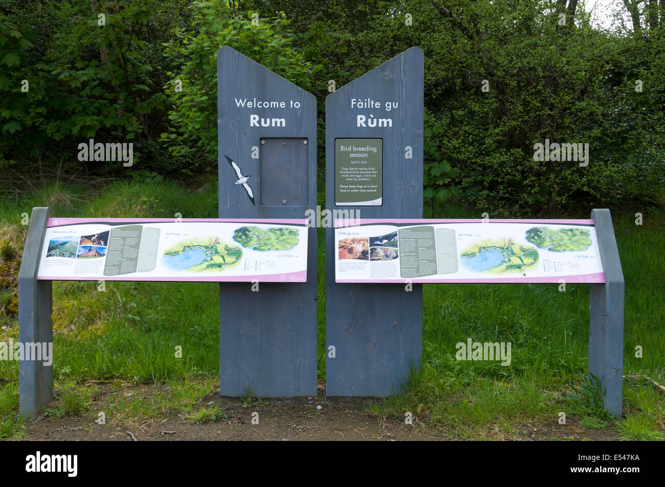 Tourist information display boards in English and Gaelic at Kinloch, Isle of Rum, Scotland, UK Stock Photo