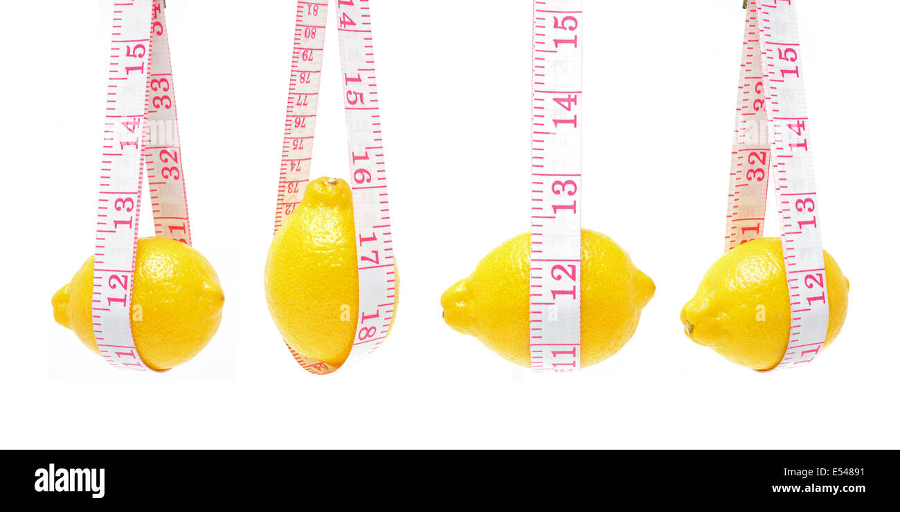 Lemon and Tape measure isolated on white background Stock Photo
