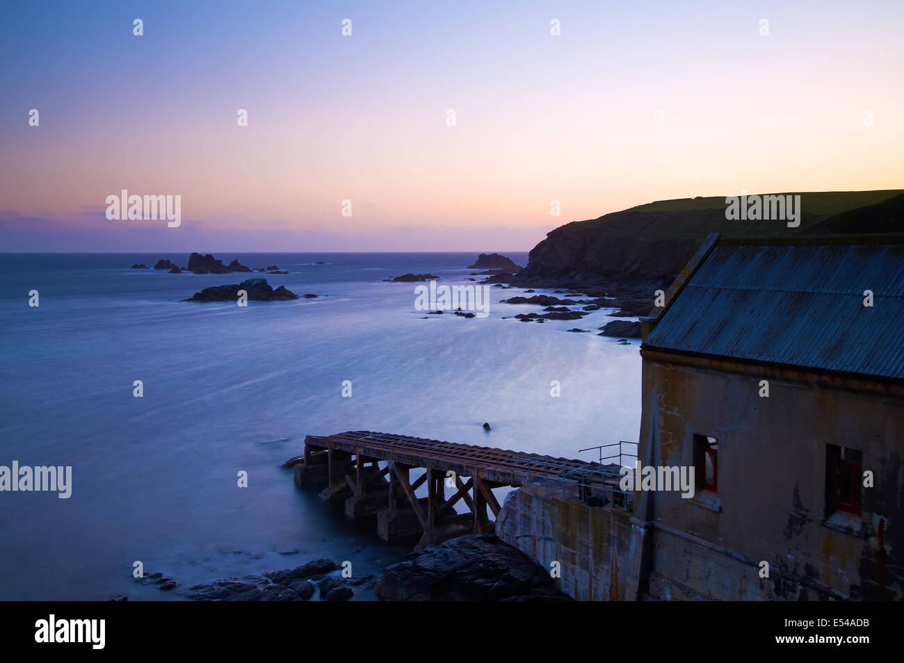The old lifeboat station at Lizard Point, shot at dusk. I found an abandoned equipment shed to take the shot. Stock Photo