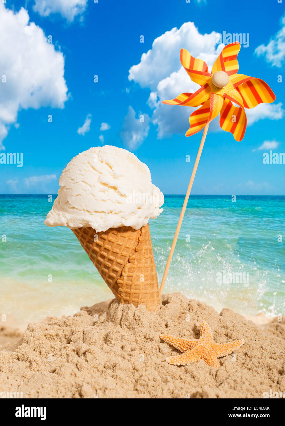 Vanilla flavor icecream with pinwheel on summer beach Stock Photo