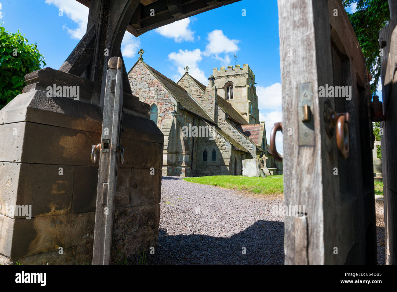 Looking through the lych gate at St Lucia's Church in the village of Upton Magna, Shropshire, England. Stock Photo