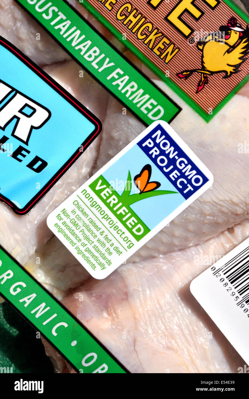 Rosie Free Range Chicken USDA organic drumsticks are packaged with a Non GMO label, which indicates Non GMO verification. Stock Photo
