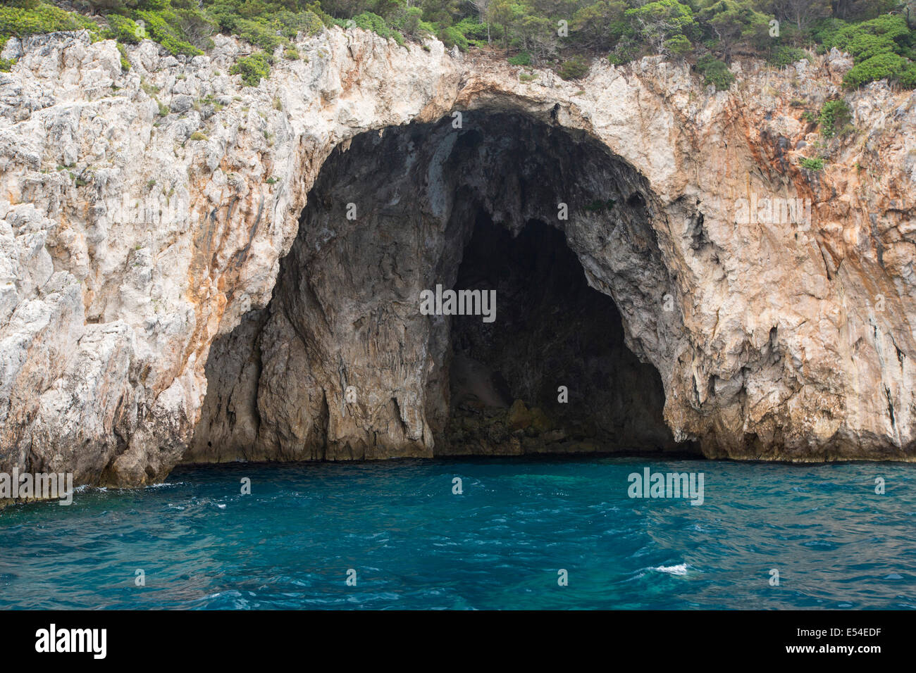 A sea cave on rocky islands off Sivota in Greece Stock Photo - Alamy