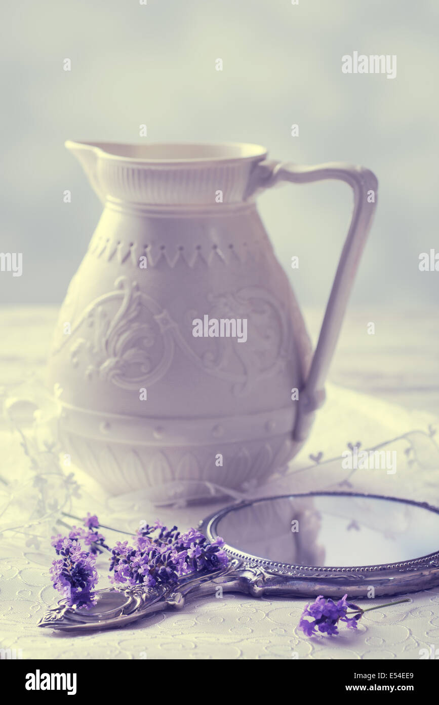 Antique mirror with lavender - vintage filter effect added Stock Photo