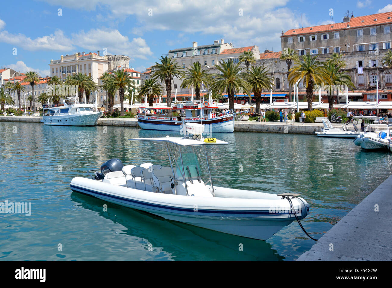 Water Taxi and other boats moored in the harbour at Split in Croatia Stock Photo