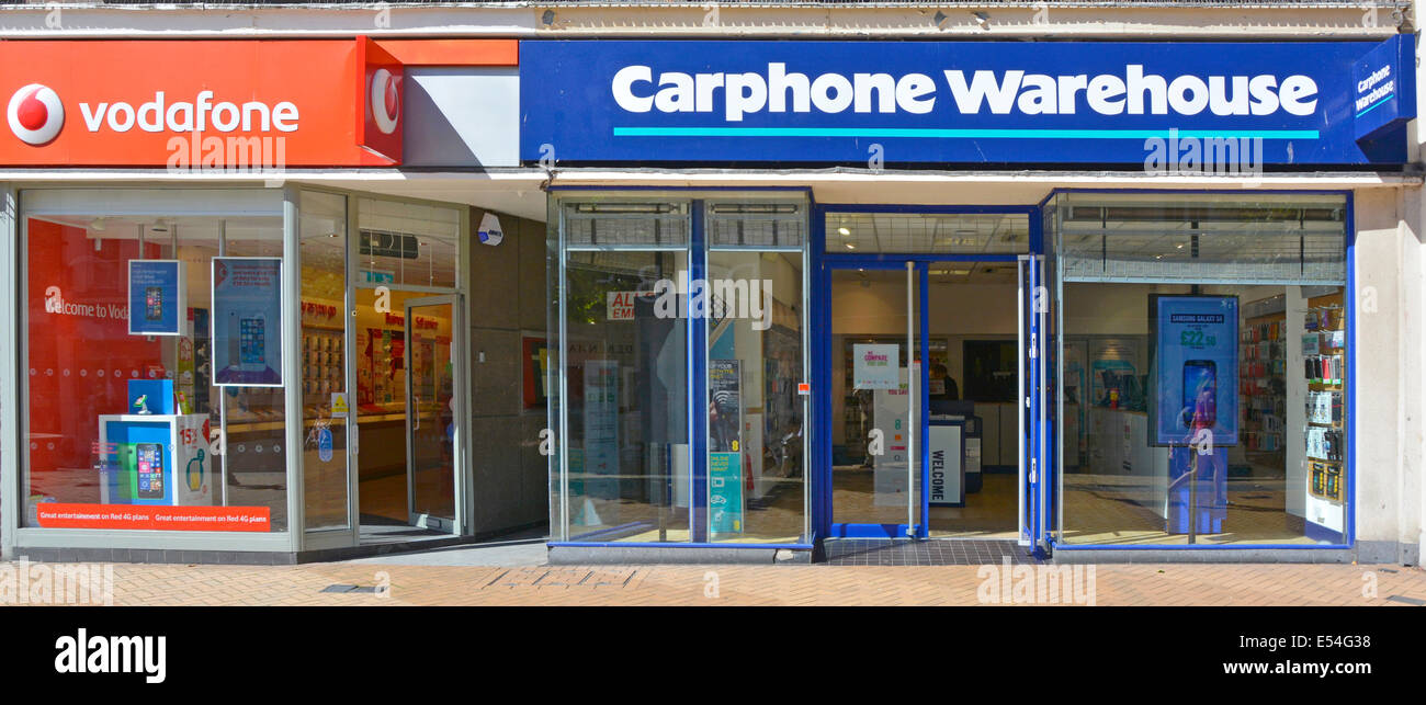 Vodafone and Carphone Warehouse shop premises in town centre shopping high street Stock Photo