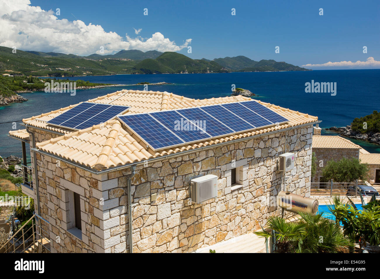 Solar panels on house in Sivota, Greece. Stock Photo