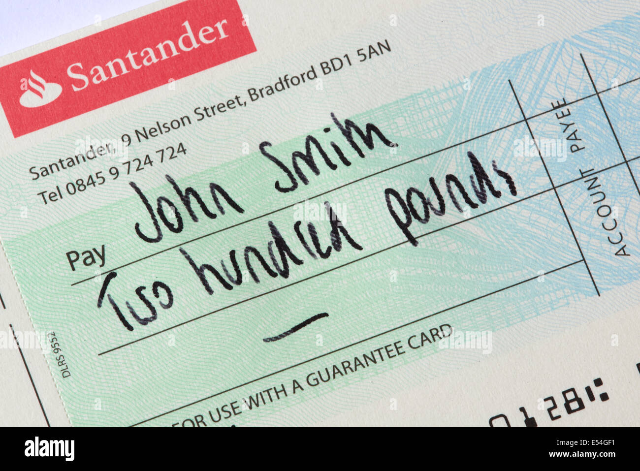 Santander Bank Cheque Payable To John Smith Stock Photo