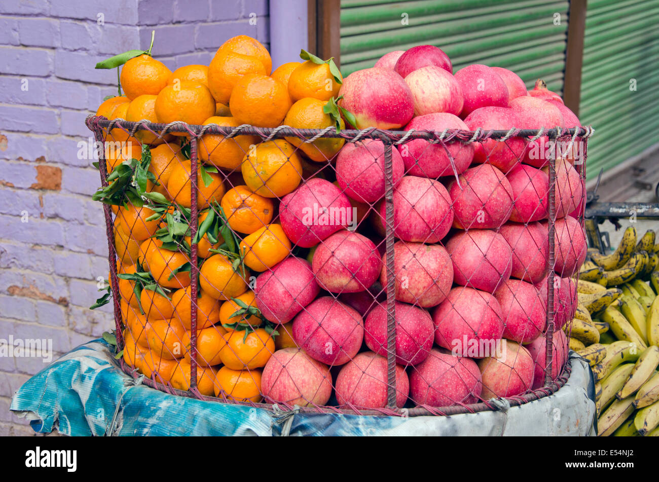 fresh pomegranate and orange fruits in asia market, Nepal Stock Photo