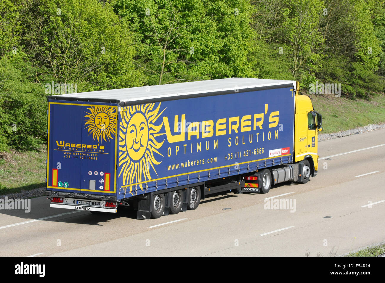 A Waberer articulated truck traveling along the M20 motorway in Kent, England Stock Photo