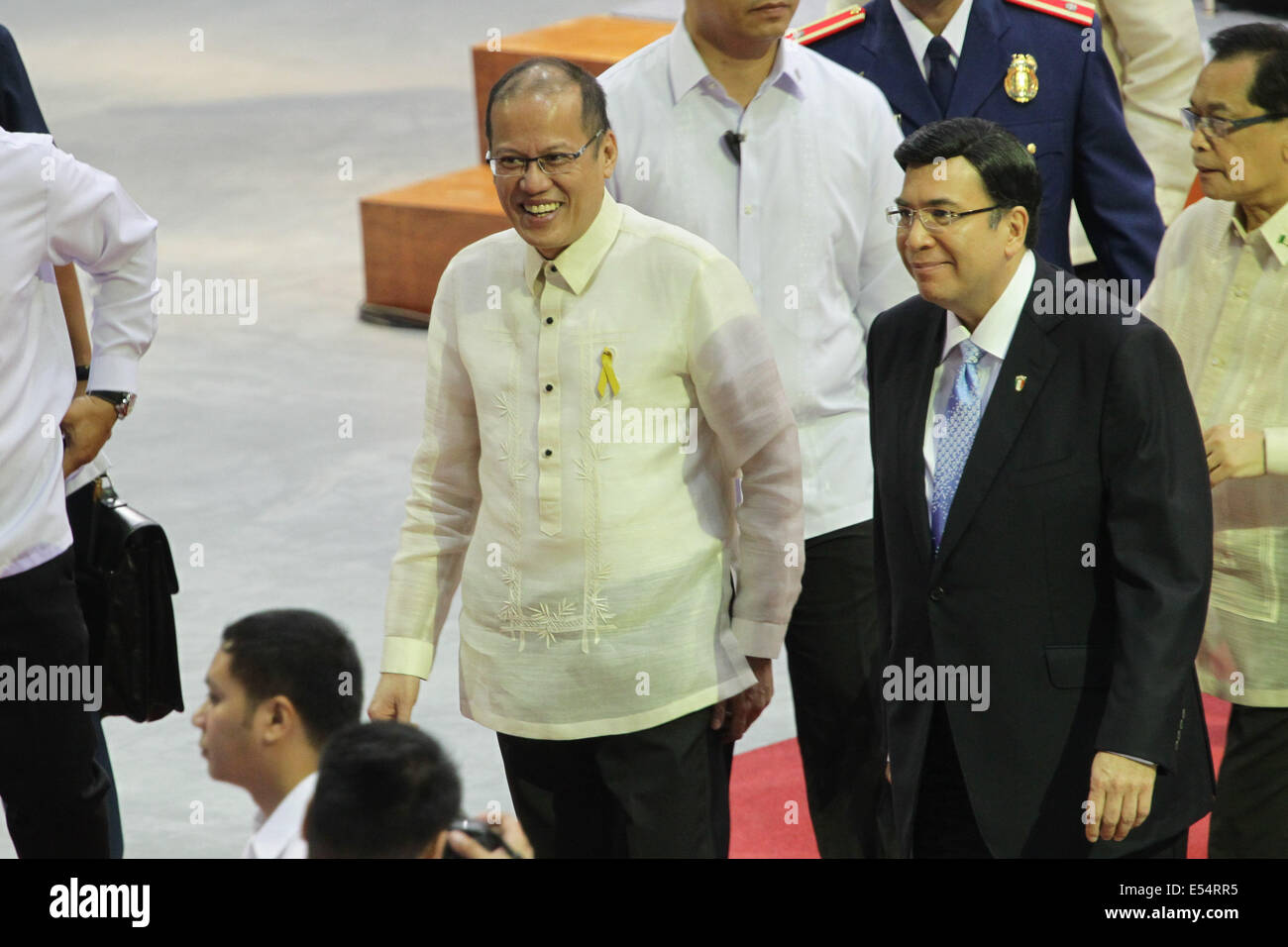 Bulacan, Philippines. 21st July, 2014. Bulacan, Philippines - Philippine President Benigno Aquino III (L) exits with Inglesia ni Cristo Executive Minsister Eduardo Manalo after the inauguration on July 21, 2014. President Benigno Aquino III (L) on Jul7, 213, 2014. The inauguration of the multi-purpose complex was lead by Inglesia Ni Cristo Executive Minister Brother Eduardo V. Manalo and President Benigno Aquino III. Credit:  ZUMA Press, Inc./Alamy Live News Stock Photo