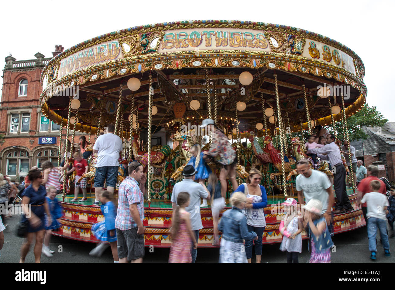 Gallopers Fairground Ride Fleetwood, Lancashire, 20th July, 2014. Riders on Gallopers fairground ...