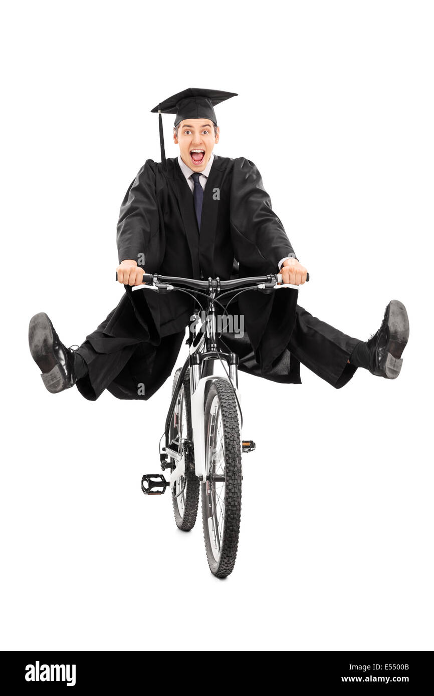 Overjoyed graduate student riding a bike isolated on white background Stock Photo