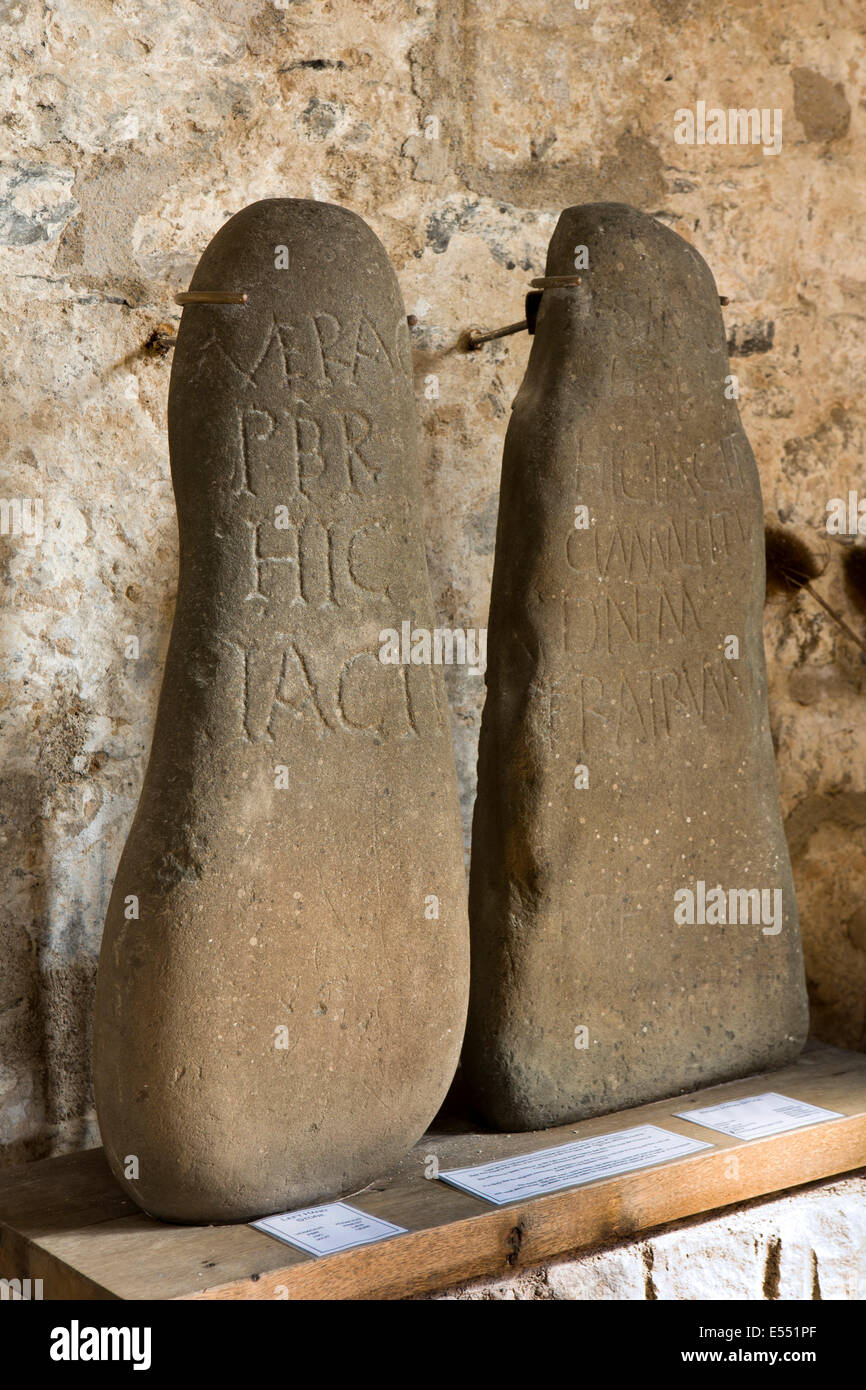 UK, Wales, Gwynedd, Lleyn peninsula, Aberdaron, St Hywyn’s Church ancient carved priests’s headstones Stock Photo