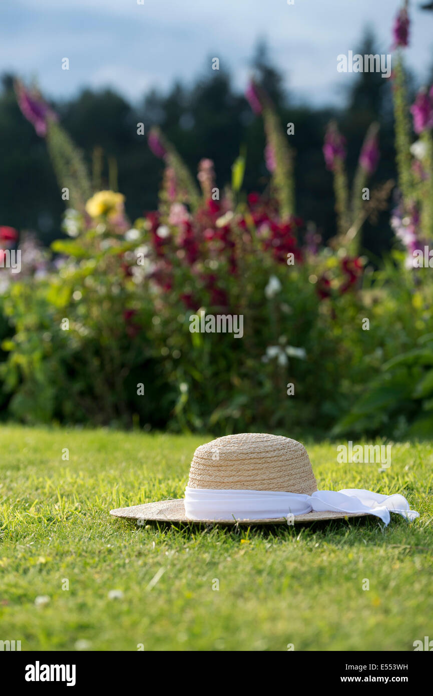 Summer with straw hat hires stock photography and images Alamy
