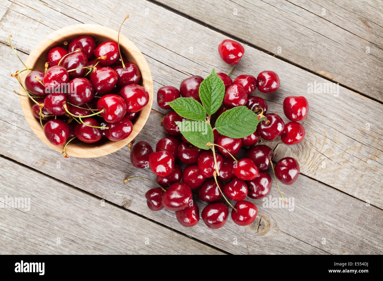 Ripe cherries on wooden table. View from above Stock Photo - Alamy