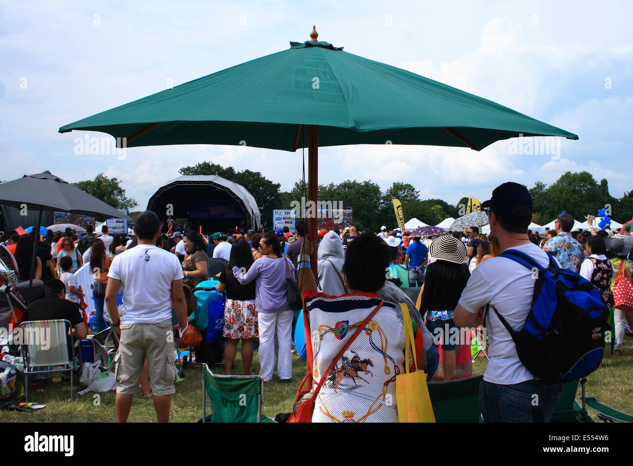 Walton, Surrey, UK. 20th July, 2014. Food, drink and stage events is what it's all about at the fiesta, this is what the philippine community from all over the UK have come to see and celebrate. Credit:  Paul Hamilton/Alamy Live News Stock Photo