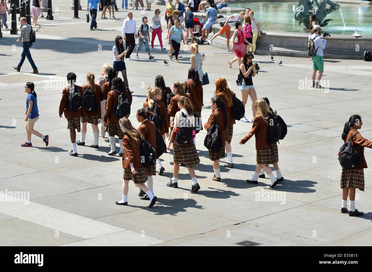 London, England, UK. Trafalgar Square: Schoolgirls in uniform on a school trip Stock Photo