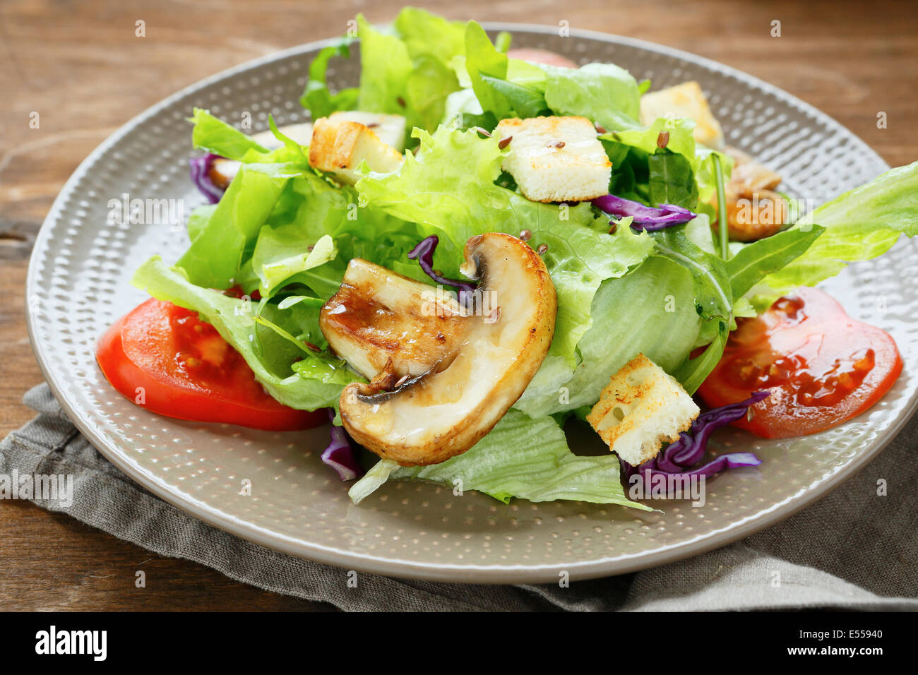 delicious crunchy salad with mushrooms, food closeup Stock Photo