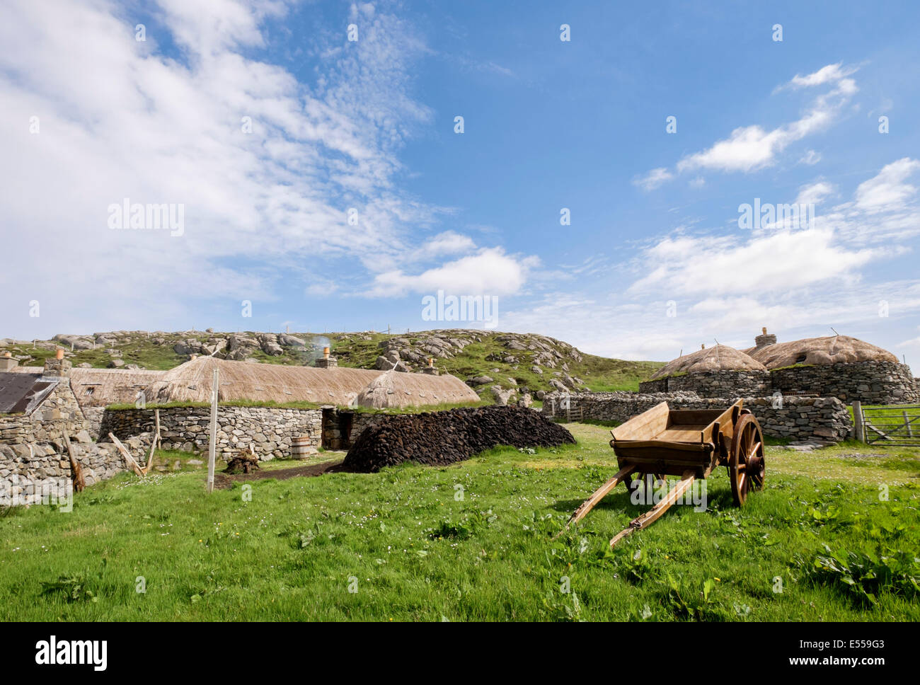 Old cart and crofts in Na Gearrannan Blackhouse Village. Garenin Carloway Isle of Lewis Outer Hebrides Western Isles Scotland UK Stock Photo