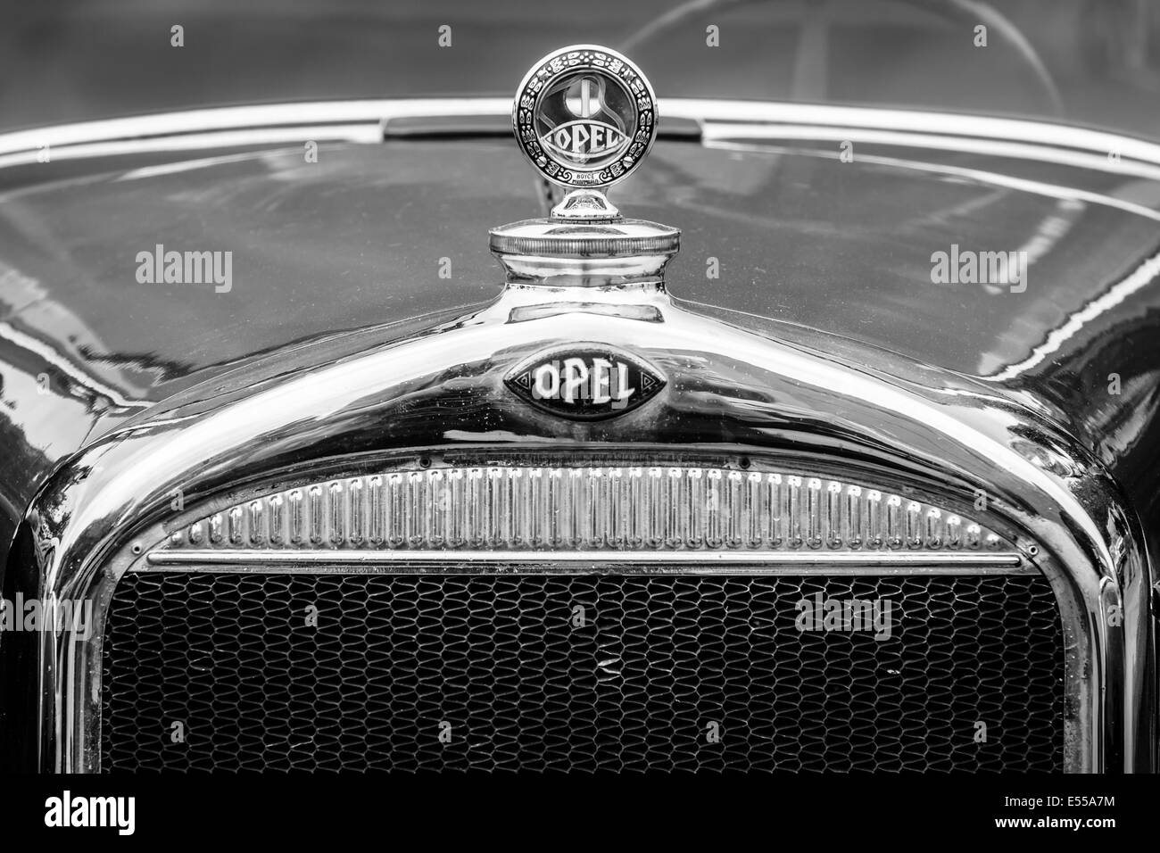 Hood ornament of the Opel 1.2-litre Cabrio-Limousine (1934). Black and white. 27th Oldtimer Day Berlin - Brandenburg Stock Photo