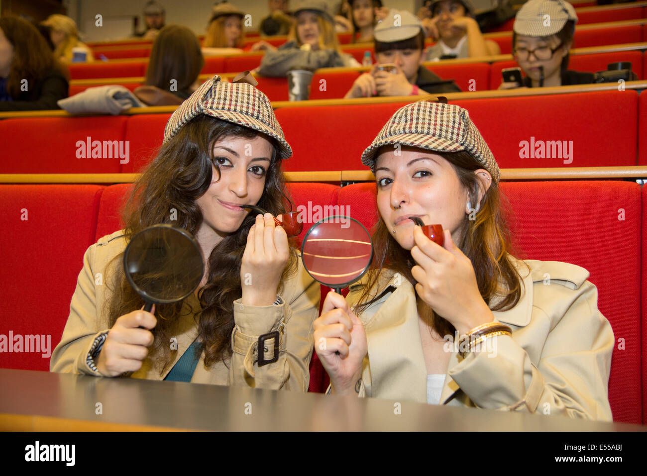 2 young women dressed as Sherlock Holmes at a Guinness Worlds Record attempt for the greatest number of people dressed as Sherlock Holmes in one place. on 19/07/2014 at University College London, London.    Picture by Julie Edwards Stock Photo