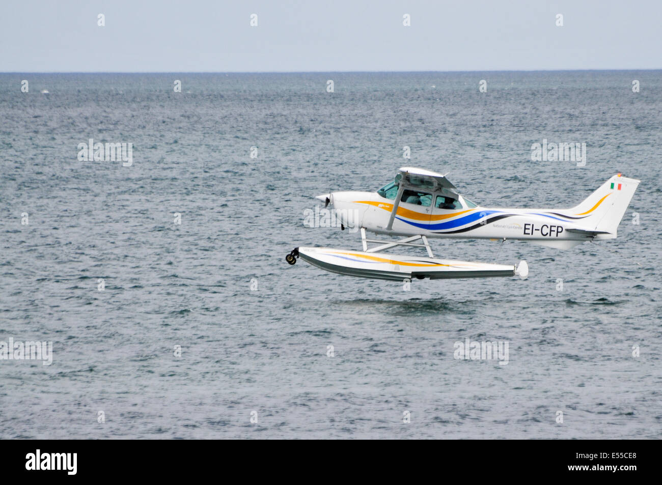 Cessna 172 (EPI-CFP), 1980, owned by William Flood, fitted with floats, Avco Lycoming engine,  lands on sea at the 2014 Bray Air Show, Ireland Stock Photo