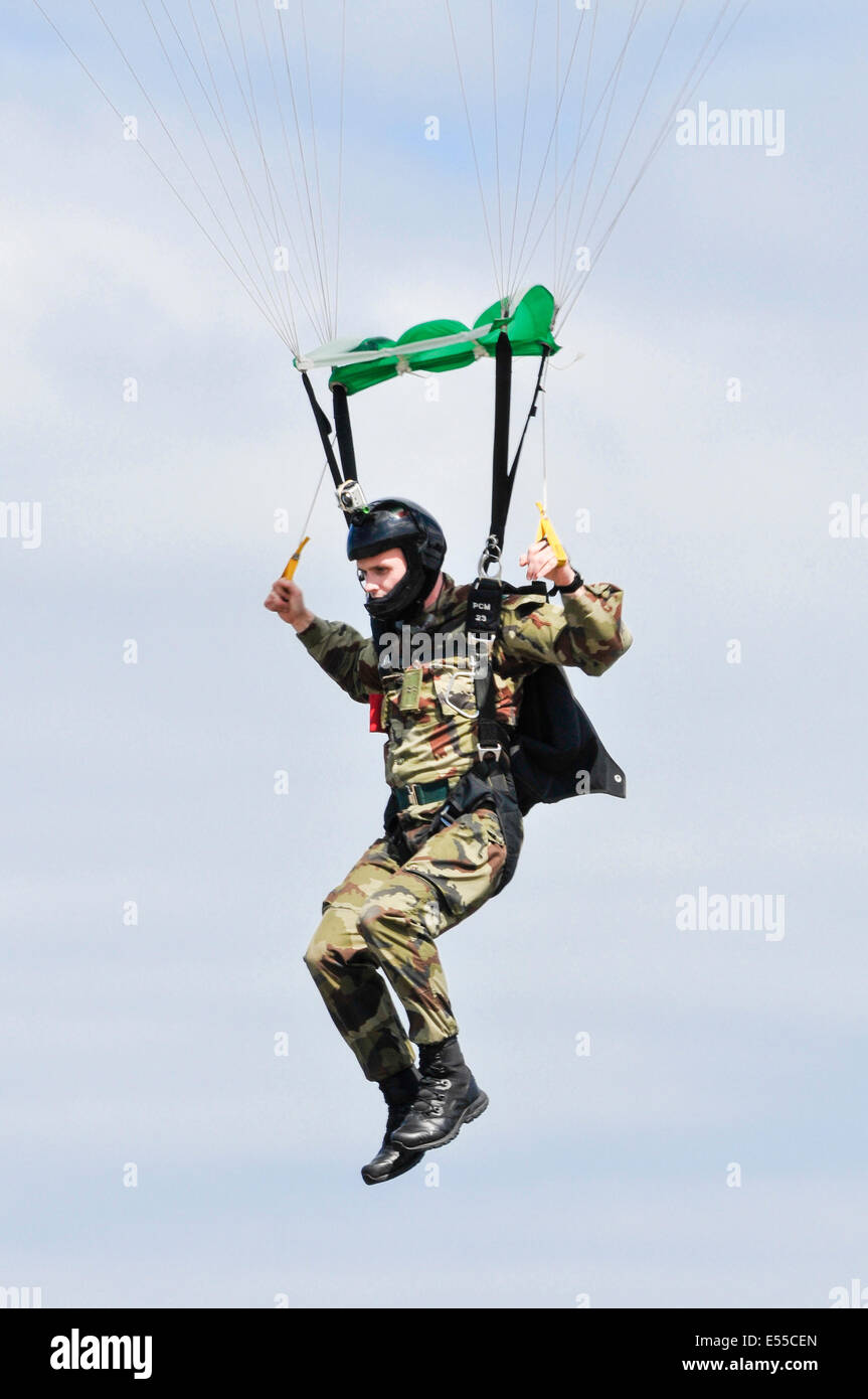 A member of the Black Knights Parachute team (from the Irish Defence Forces) comes in to land Stock Photo
