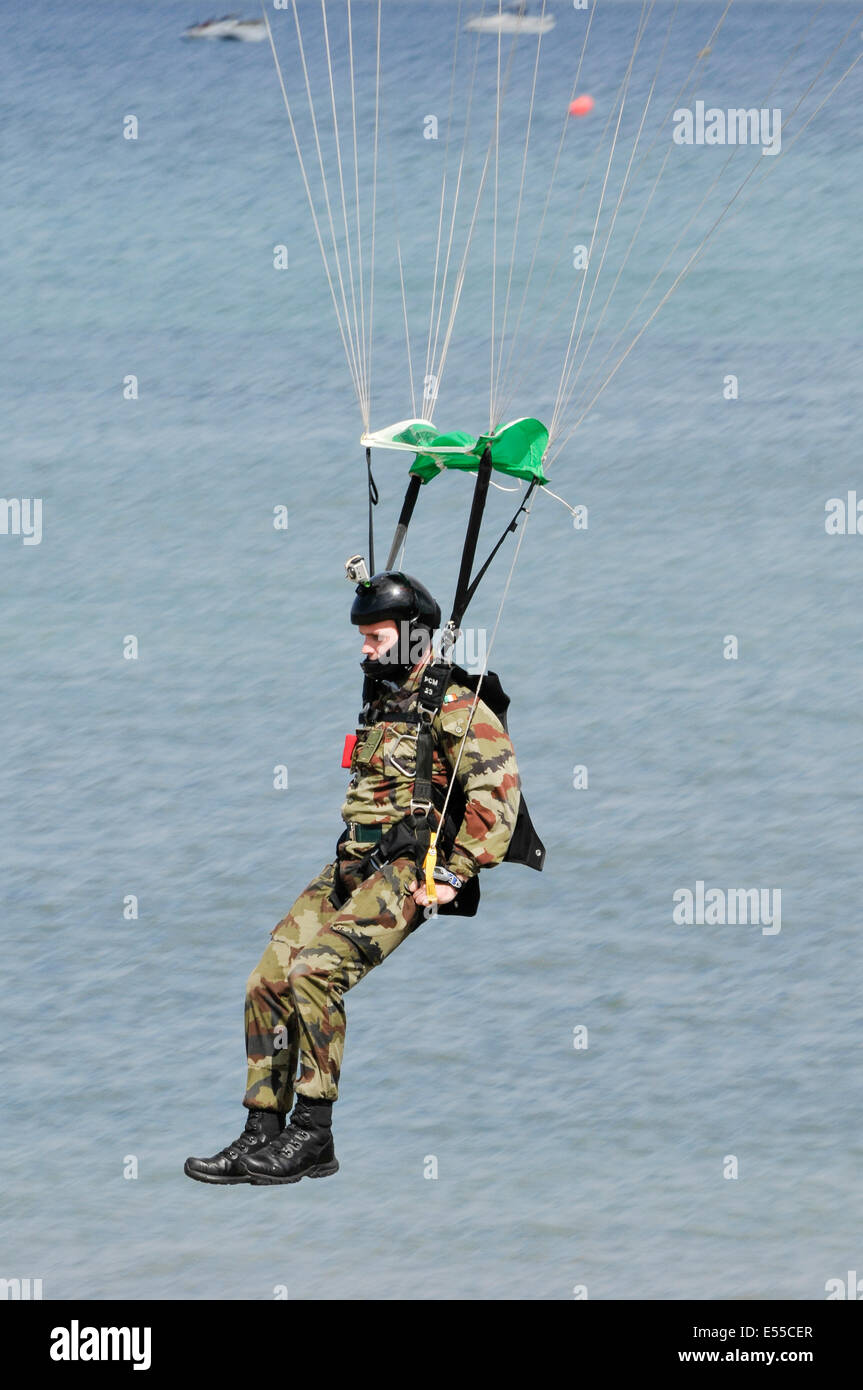 A member of the Black Knights Parachute team (from the Irish Defence Forces) comes in to land Stock Photo