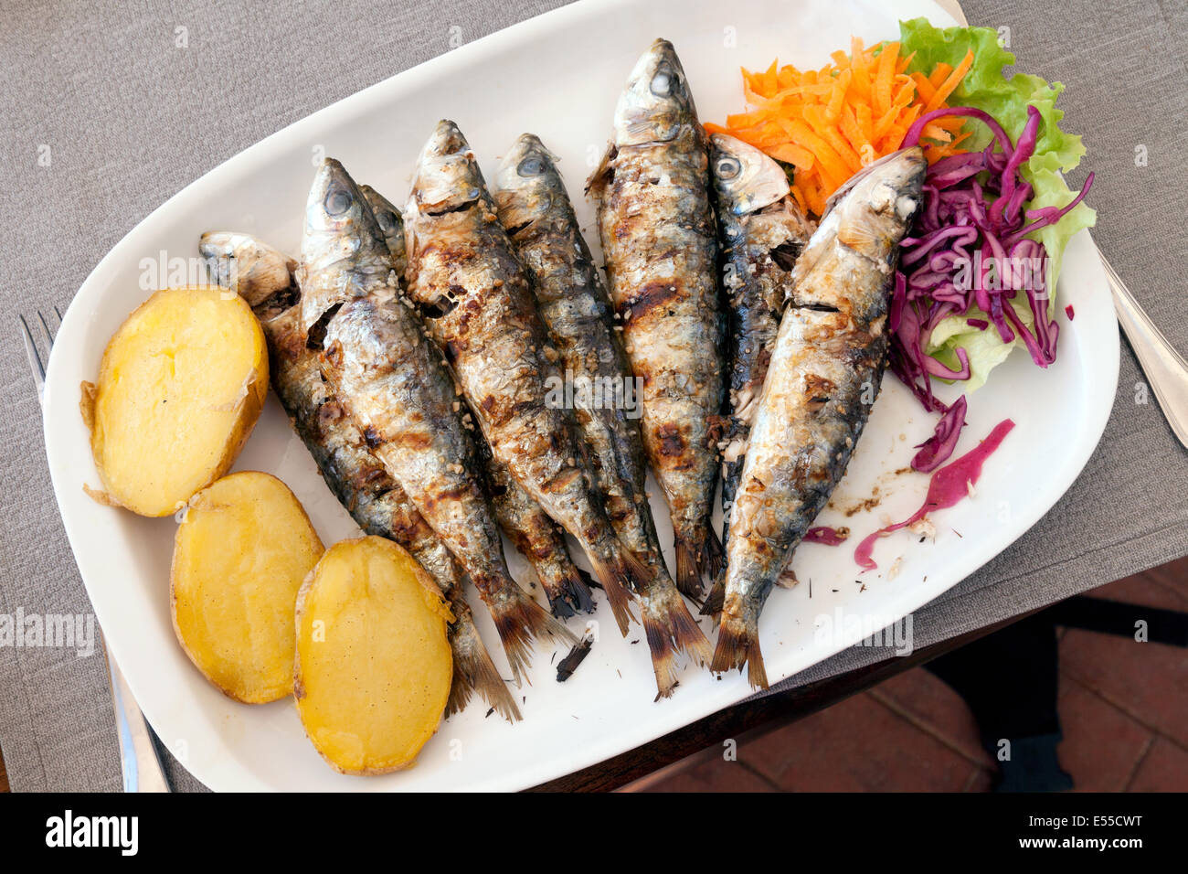 Plate of sardines for a meal in a restaurant, Carvoeiro, Algarve