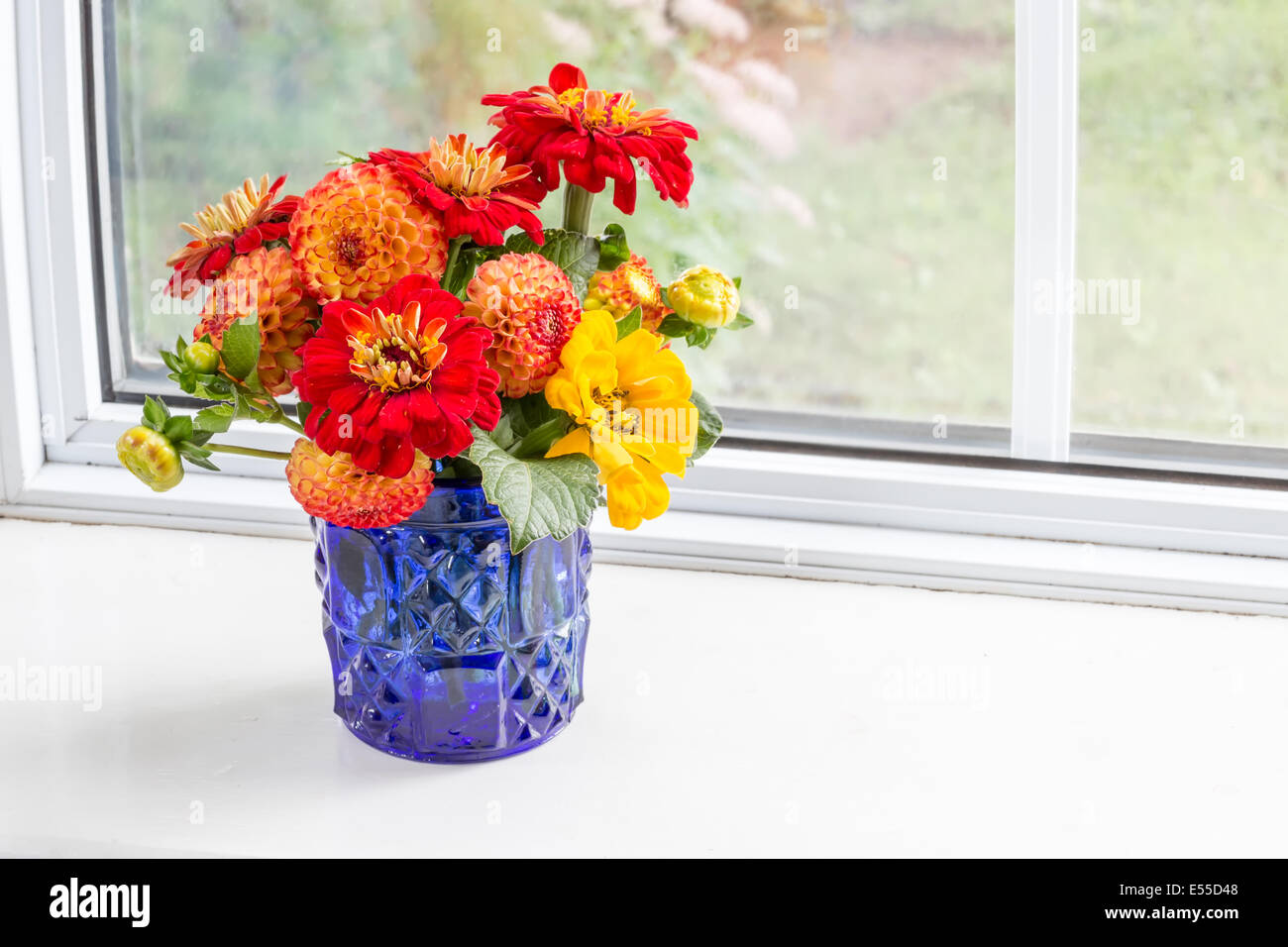 Home style fall bouquet with garden flowers. Stock Photo