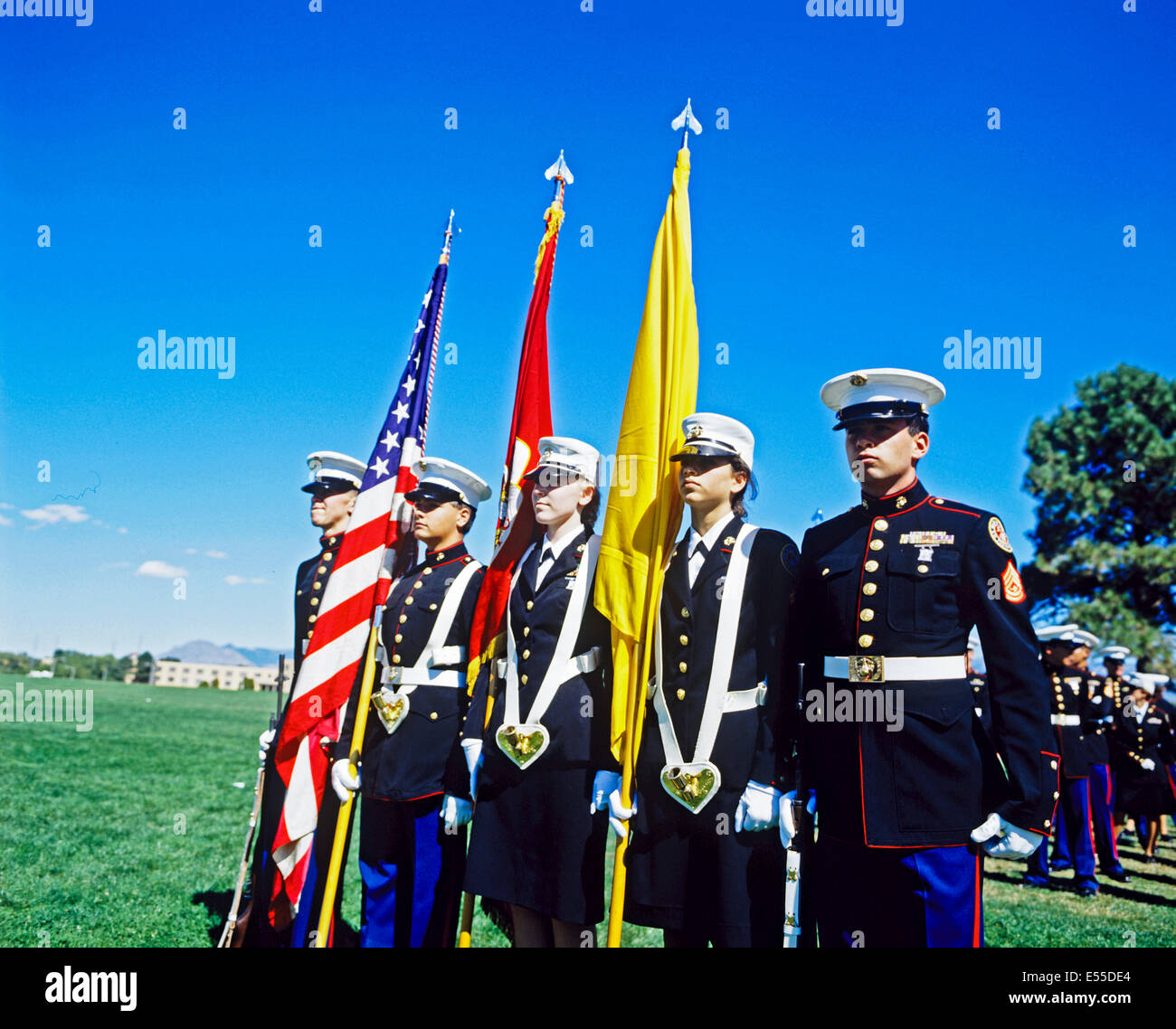 Group of army officers in uniform holding the USA flag, Albuquerque