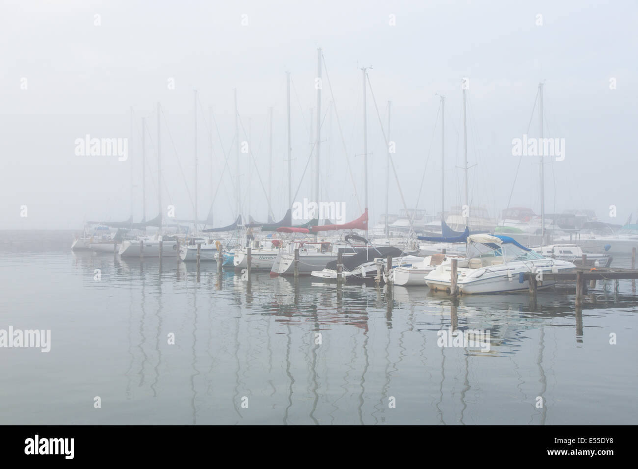 Fog over harbor and marina on Seneca Lake in Watkins Glen New York in the Finger Lakes region of New York Stock Photo