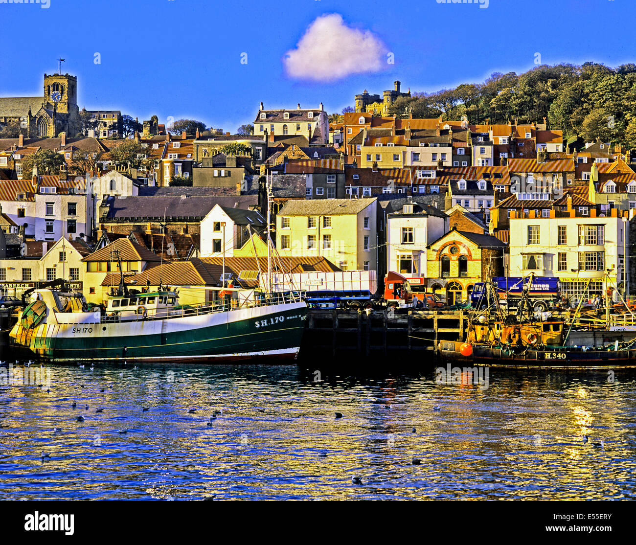 View of Vazon Bay showing riverside buildings, Guernsey, Channel Islands Stock Photo