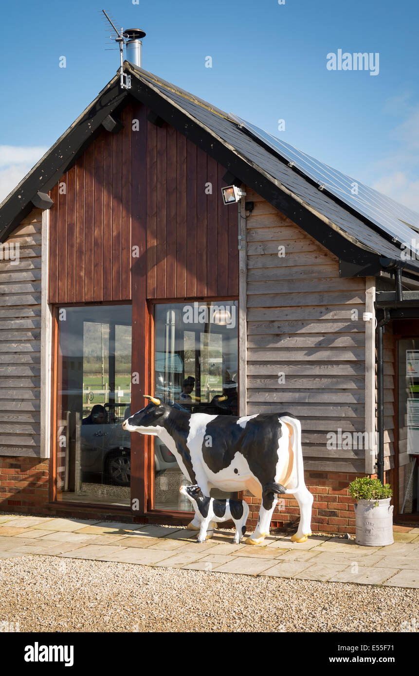 Model dairy cow and calf at Rowdy Cow cafe in Rowde Devizes UK Stock Photo