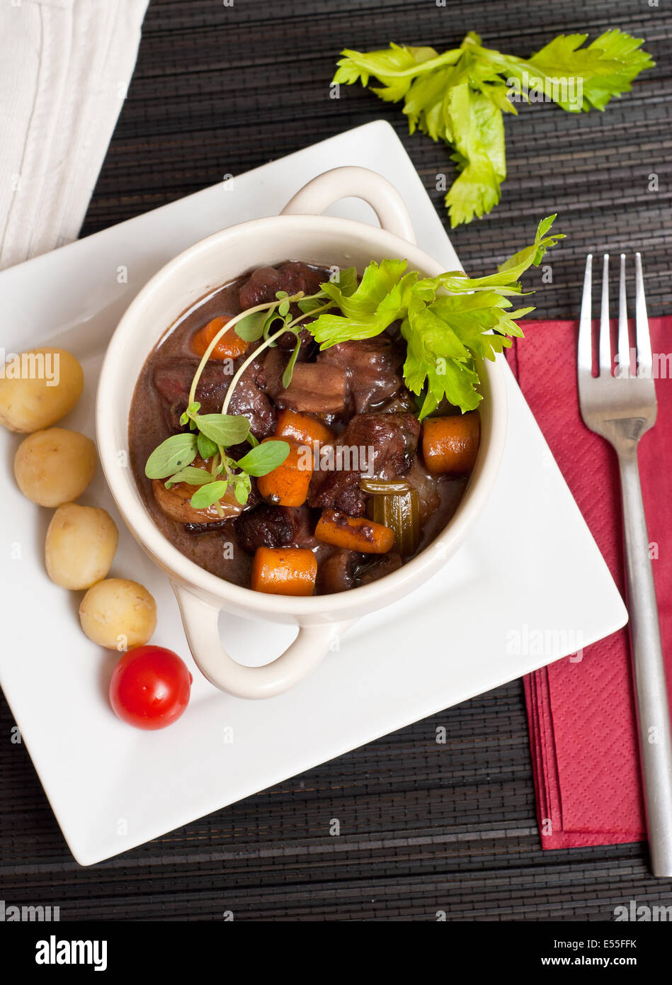 Boeuf bourguignon with carrots, onions and mushrooms Stock Photo
