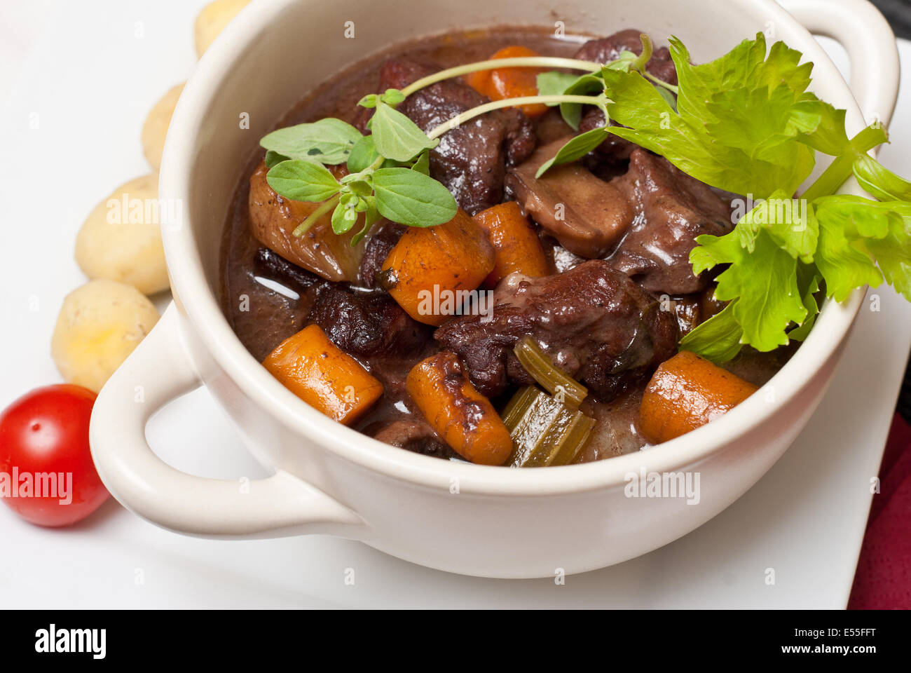 Boeuf bourguignon with carrots, onions and mushrooms Stock Photo