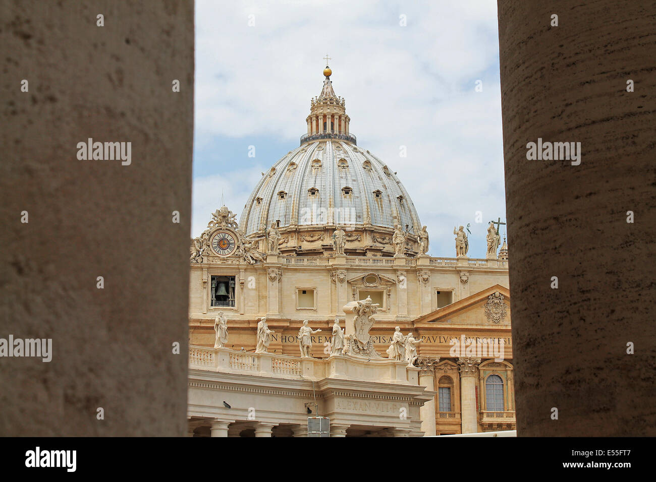 St Peter Basilica seen between columns in Vatican City Stock Photo - Alamy