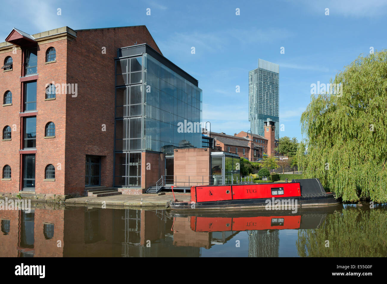 The Castlefield Urban Heritage Park and historic inner city canal conservation area with Beetham Tower in Manchester, UK. Stock Photo