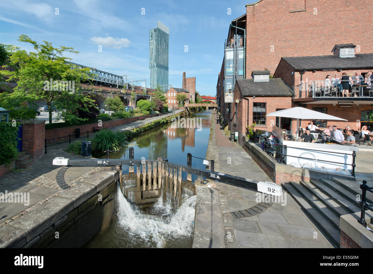 The Castlefield historic inner city canal area including Dukes 92 and lock and Beetham Tower (background) in Manchester UK Stock Photo