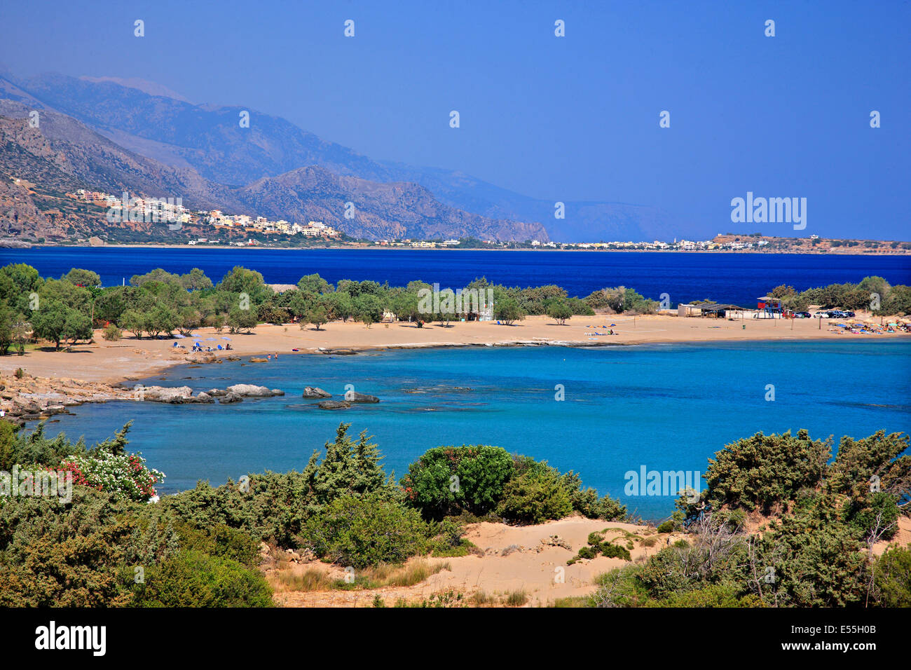Beautiful Grammeno beach close to Palaiochora village (in the background), Chania, Crete island, Greece Stock Photo