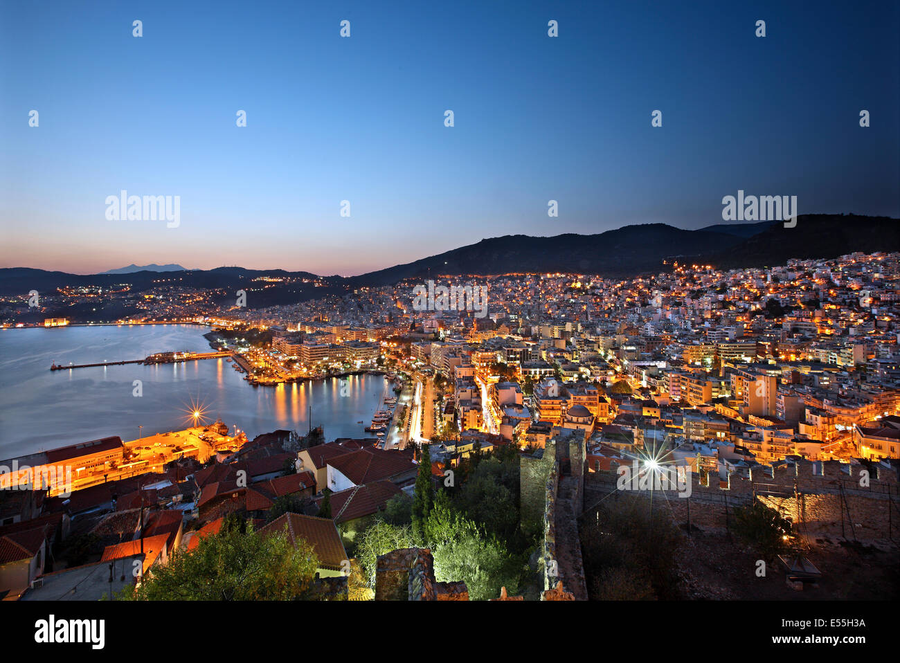 Panoramic night view of the port of Kavala from the castle of the city. you can see both the old and the modern part of Kavala. Stock Photo