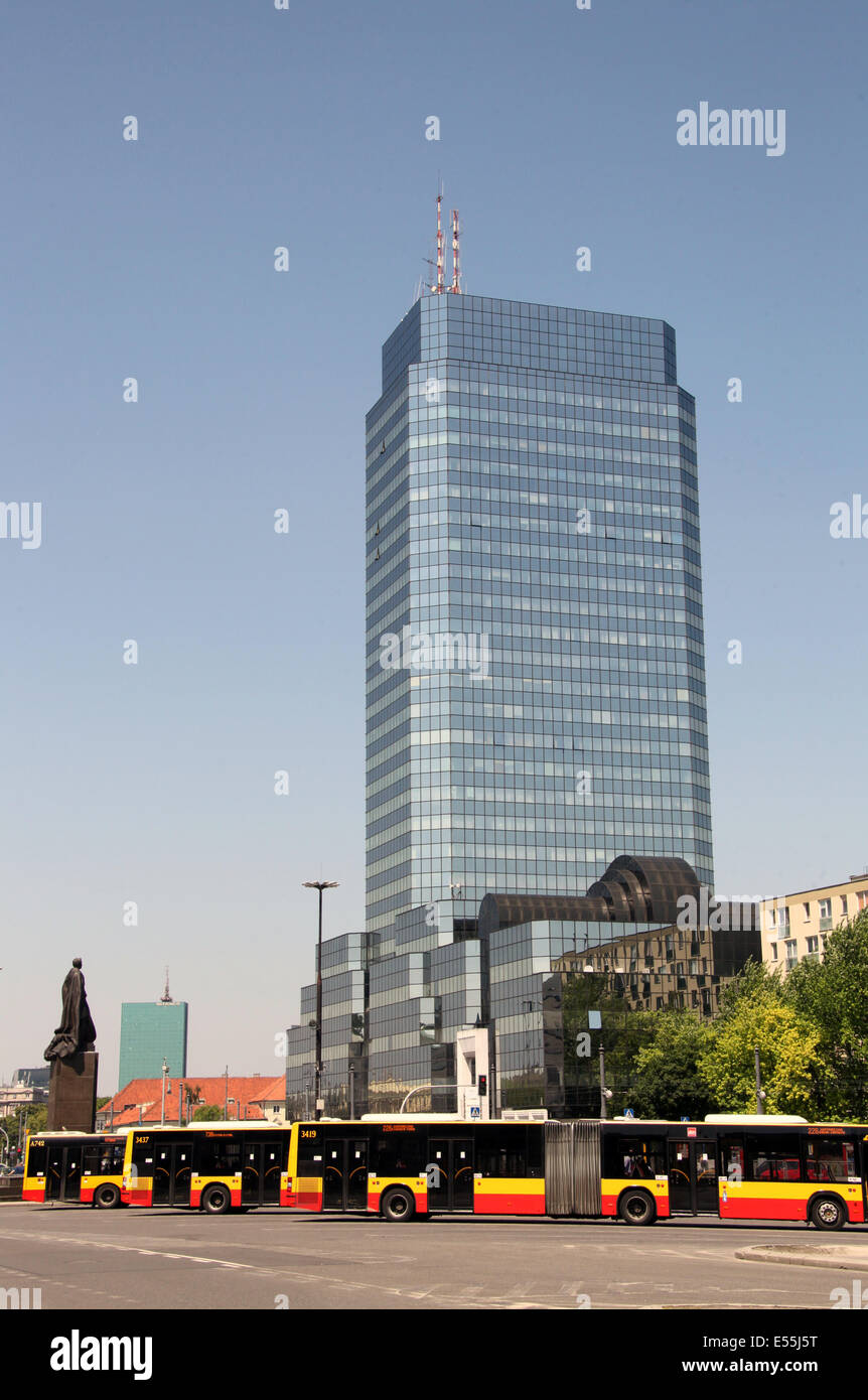 Buses in front of Blekitny Wiezowiec or the Blue Skyscraper in Warsaw Stock Photo